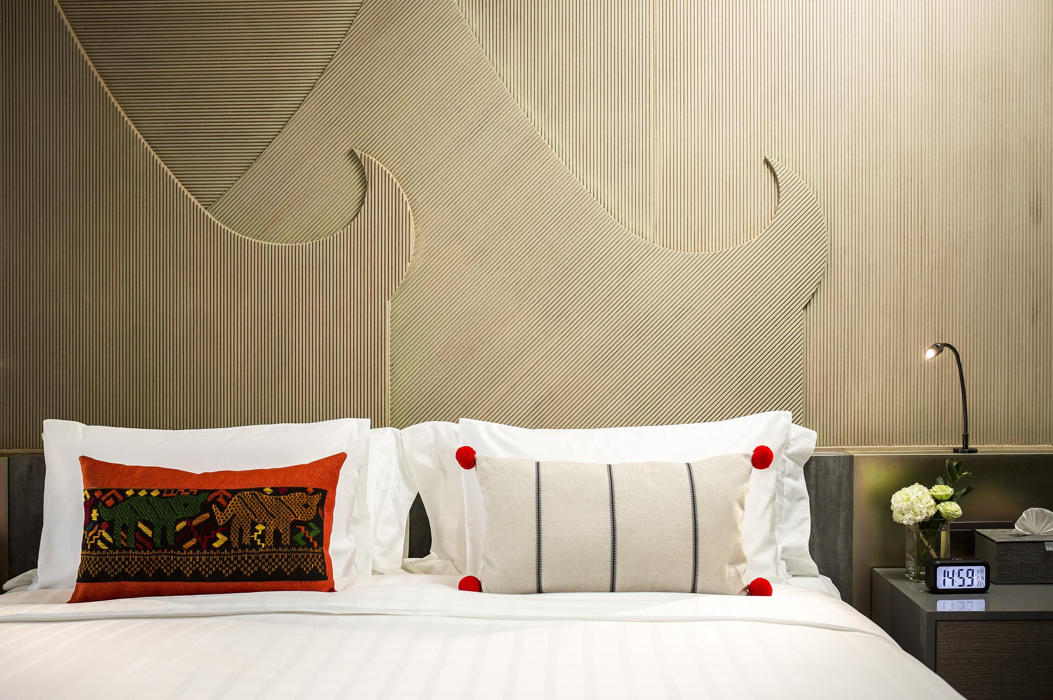 清邁u尼姆曼酒店 外观 照片 A bed with cushions